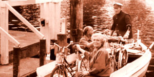 Rowboat Ferry with Passengers and Bikes